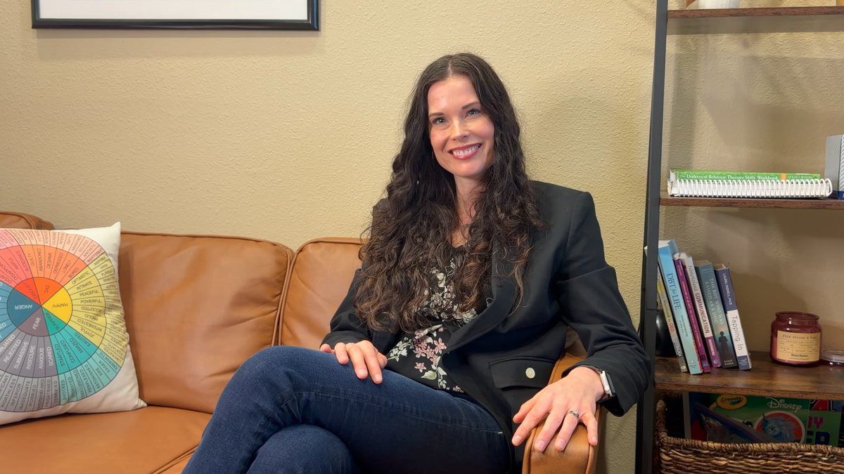 Bonnie King seated in a therapy room