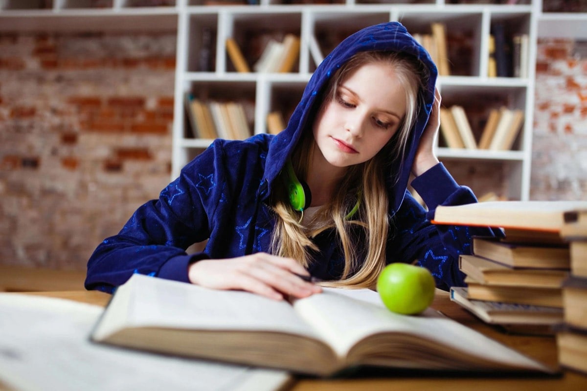Teen in trauma therapy in Frisco, Texas journaling