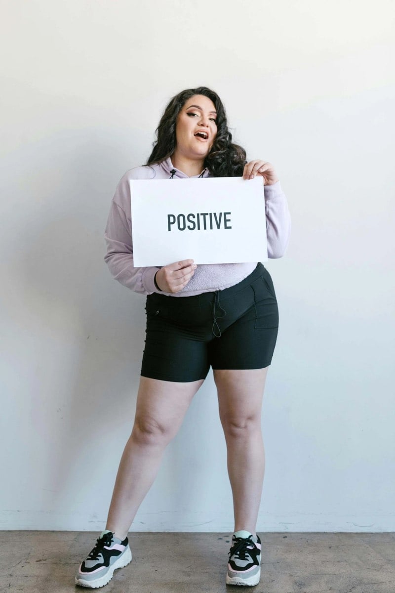 woman accepting herself after trauma therapy in Frisco, Texas