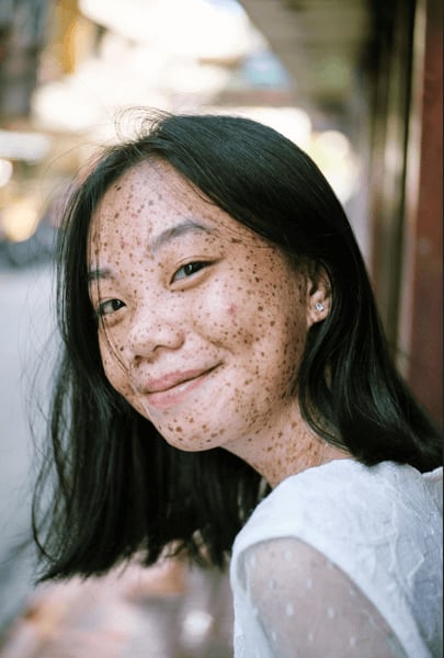 happy teen after counseling for teens and trauma therapy in Frisco, Texas