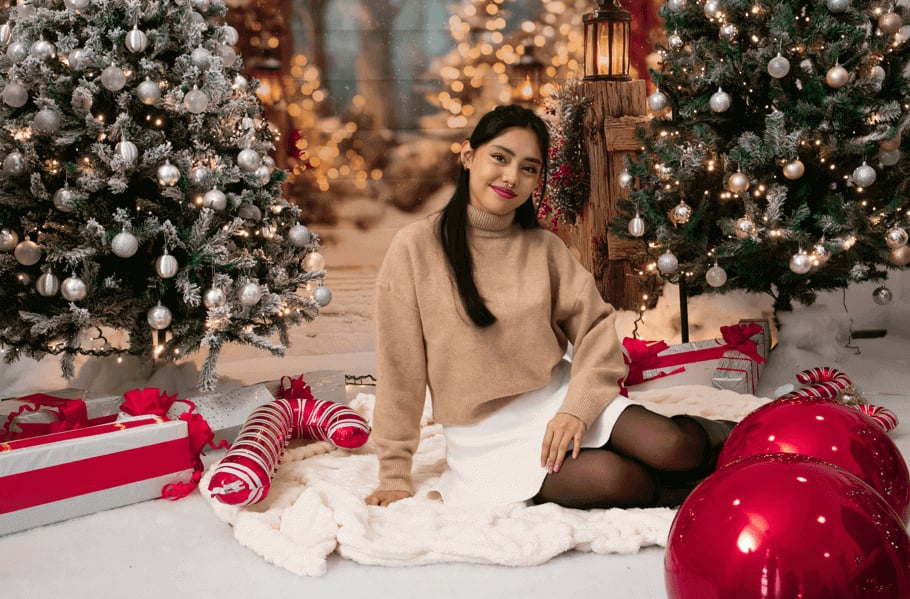 woman celebrating the holidays after trauma therapy, PTSD therapy, counseling for teens, or postpartum therapy in Frisco, Texas